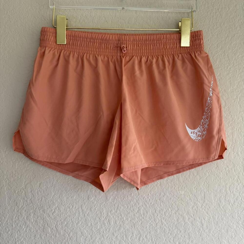 NIKE peach running shorts